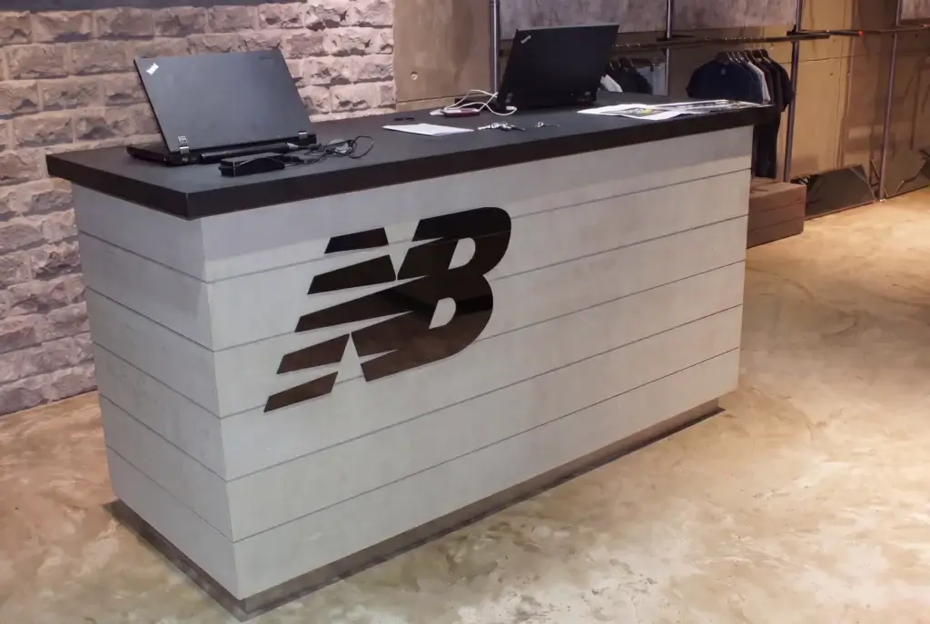 new-balance-branded-reception-desk-shopfitting
